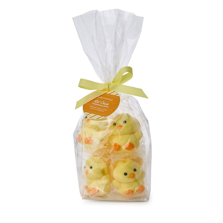 Packaged yellow duck-shaped marshmallows with a ribbon on a white background