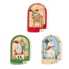 Three wooden games featuring a reindeer, Santa Claus, and snowman on a white background.