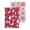 Red and white Christmas-themed reversible towel showing both sides with reindeer, trees, and snowflakes on a white background.