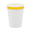 Paper cup with blue and white striped design and gold foil scalloped rim on a white background