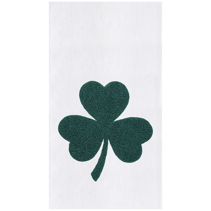 White towel with a green shamrock design on a white background