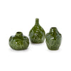 Three green ceramic vases with floral patterns on a white background