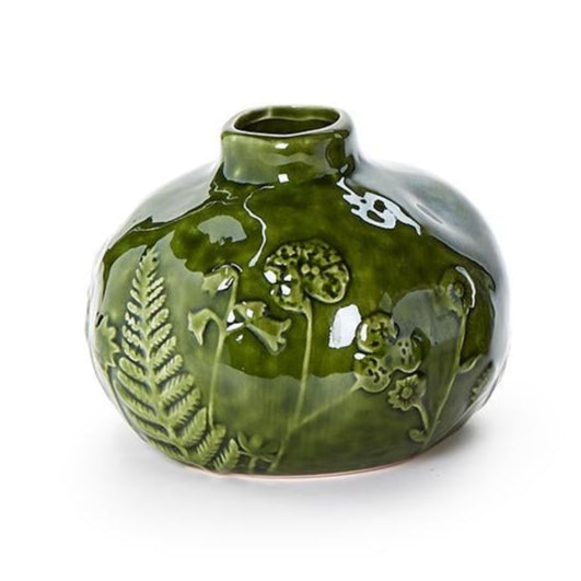 Green ceramic vase with floral and leaf patterns on a white background