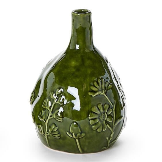 Green ceramic vase with floral patterns on a white background