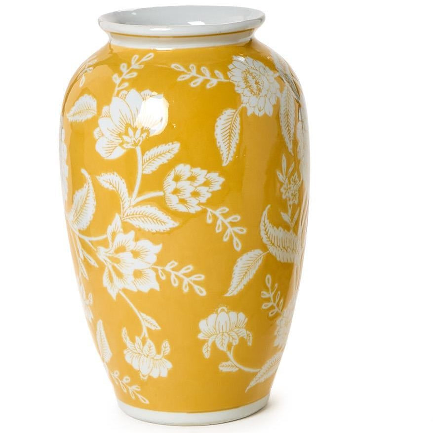 Yellow vase with white floral patterns on a white background