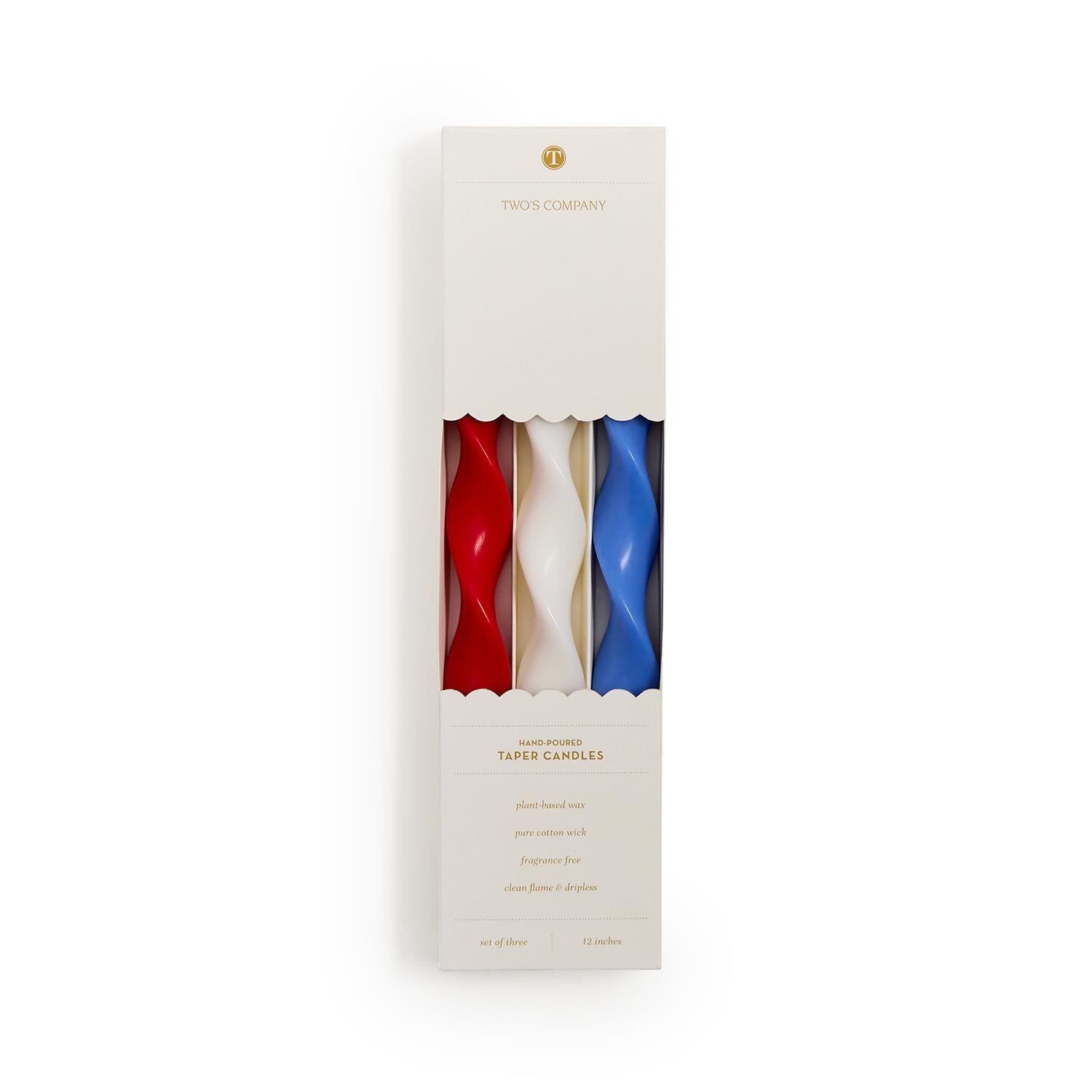 Packaged candles in red, white, and blue with a visible brand logo on a white background