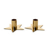 Two gold candle holders shaped like stars on a white background