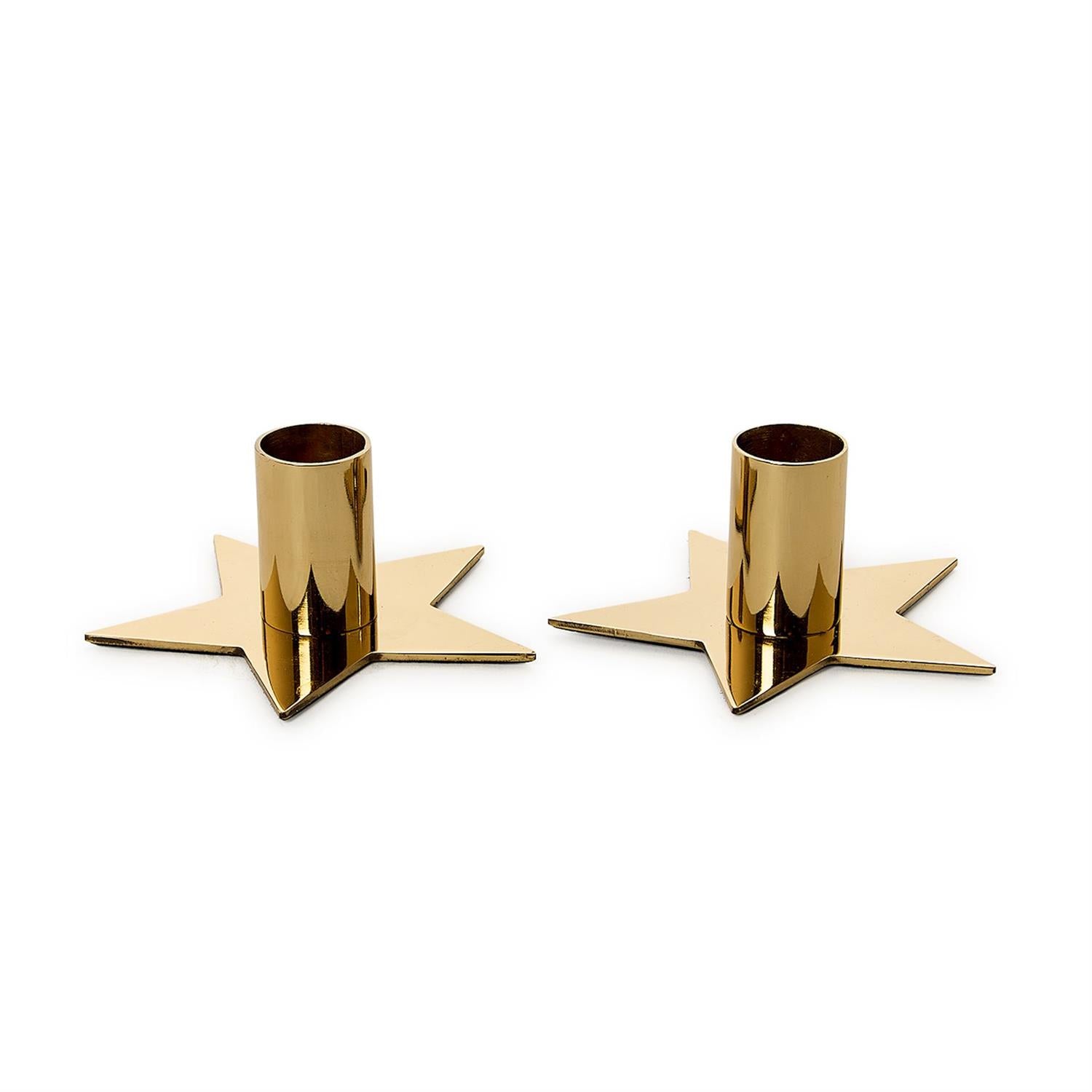 Two gold candle holders shaped like stars on a white background