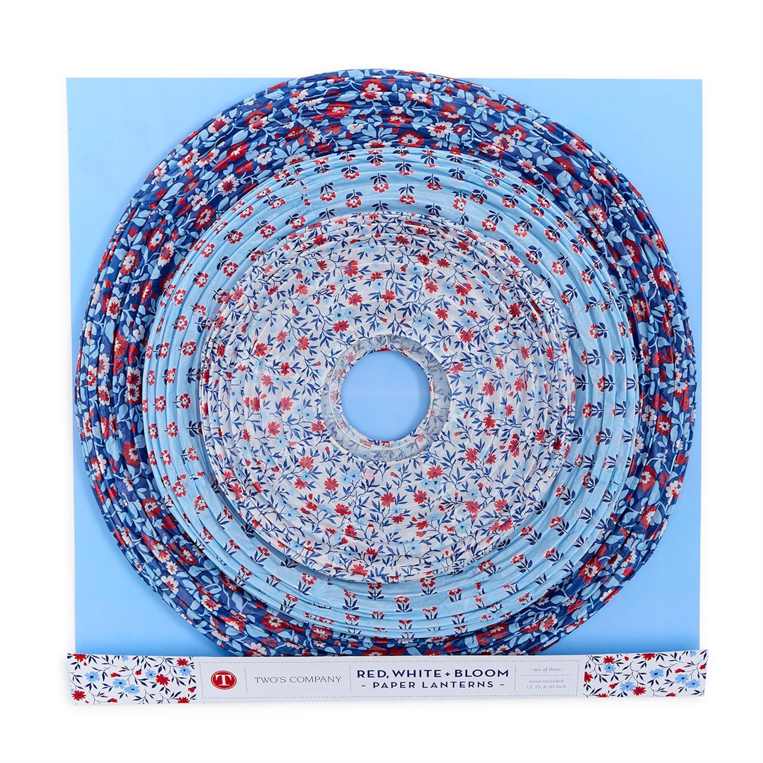 Package of floral-patterned paper lanterns on a white background