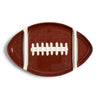 Football-shaped serving platter on a white background