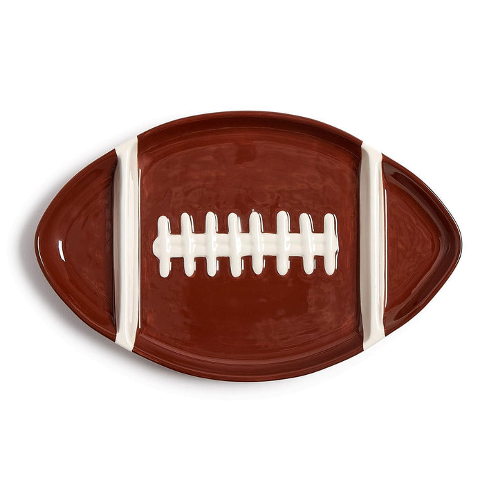 Football-shaped serving platter on a white background