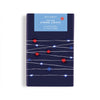 LED string lights packaging with red, white, and blue lights on a dark blue background