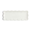 Rectangular white dolomite plate with scalloped edge on a white background