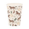 Paper cup with horse and cowboy boot pattern on a white background