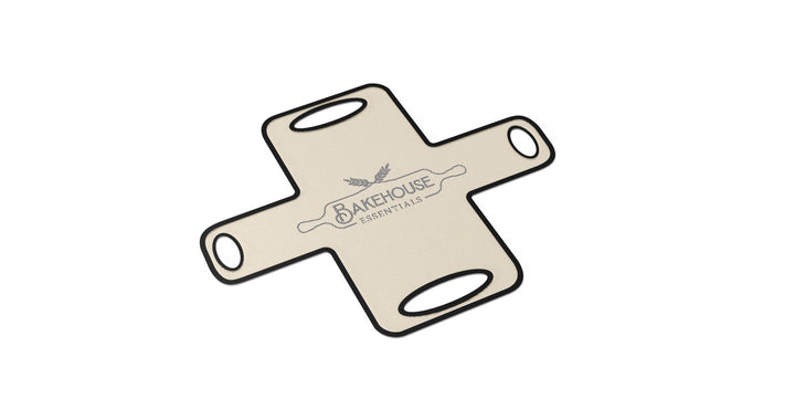 Beige silicone bread pan liner with a brand logo on a white background