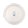 White paper plate with scalloped edge on a white background