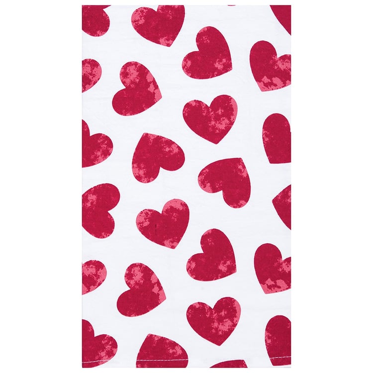A tea towel featuring a repeating pattern of watercolored red hearts.