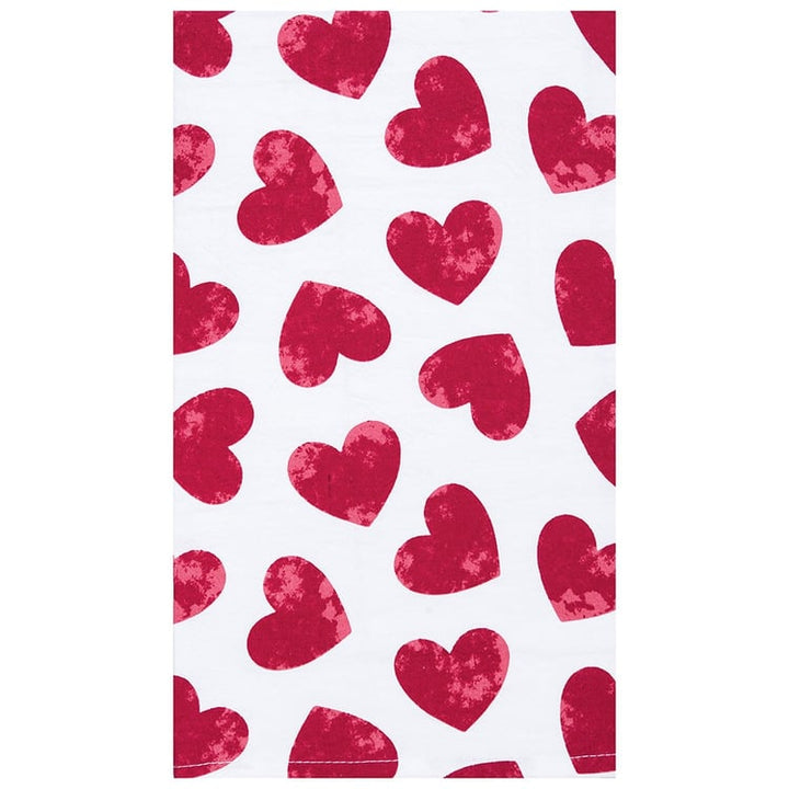 A tea towel featuring a repeating pattern of watercolored red hearts.