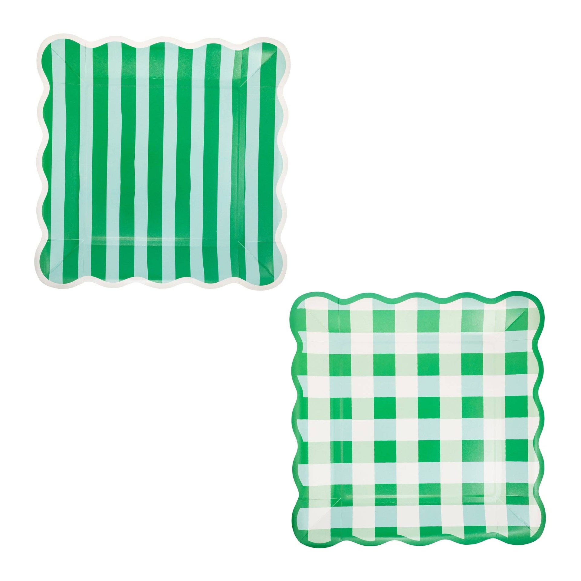 Two green and white patterned plates on a white background