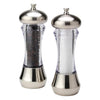 Pepper and salt mills with clear bodies and silver tops on a white background