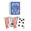 Playing cards with a blue box featuring floral designs and an American flag, displayed on a white background.