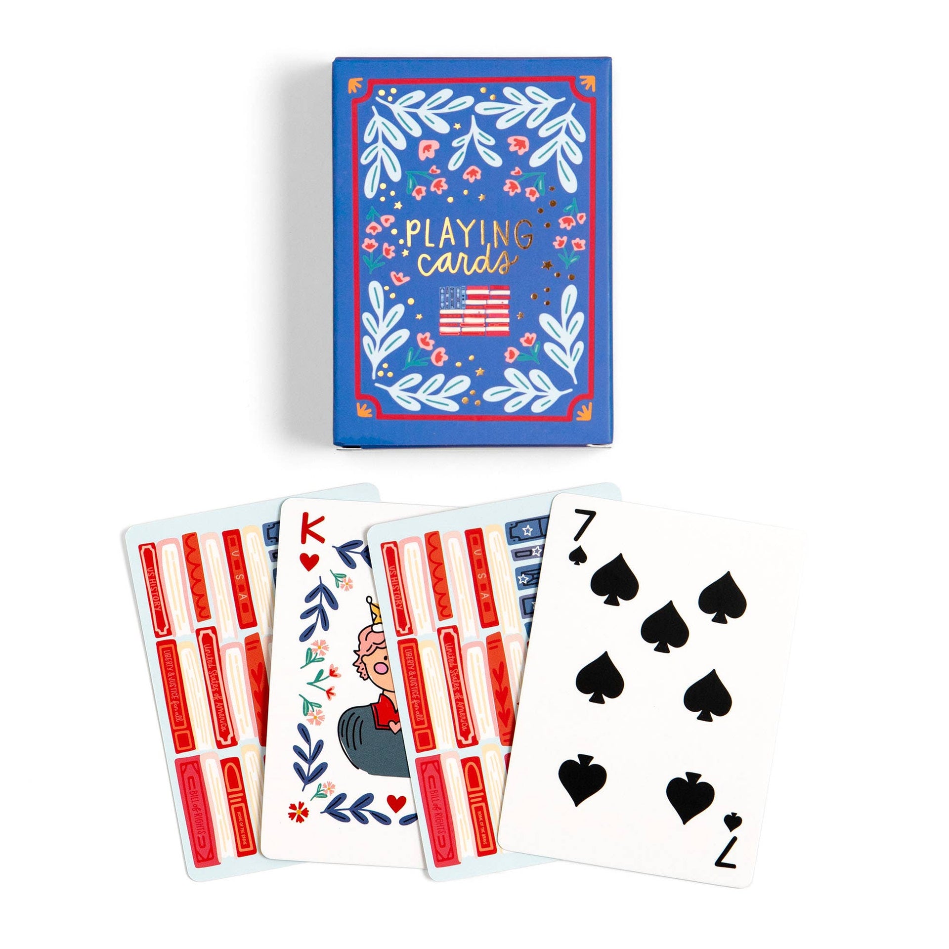 Playing cards with a blue box featuring floral designs and an American flag, displayed on a white background.