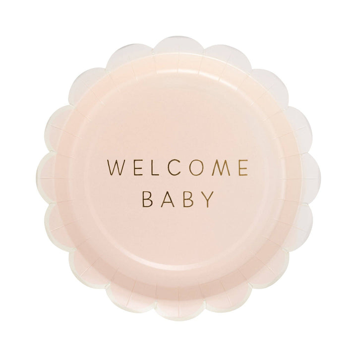 Pink baby shower scalloped edge paper plate with 'Welcome Baby' text on a white background