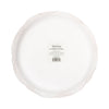 Back view of scalloped paper plate with a visible brand label on a white background