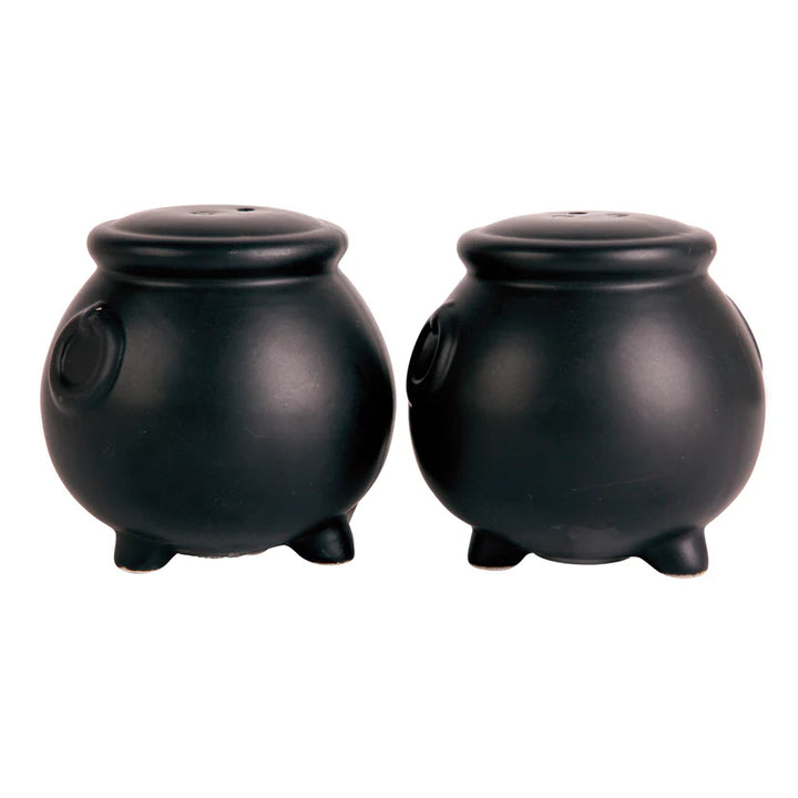Two black cauldron-shaped salt and pepper shakers on a white background