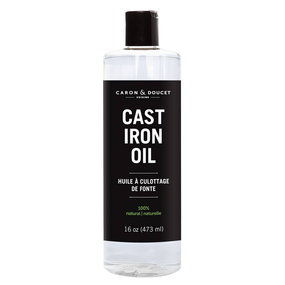 Bottle of Caron & Doucet Cast Iron Oil on a white background