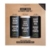 Caron & Doucet Cast Iron Ultimate Care Set packaging with three bottles on a cardboard background