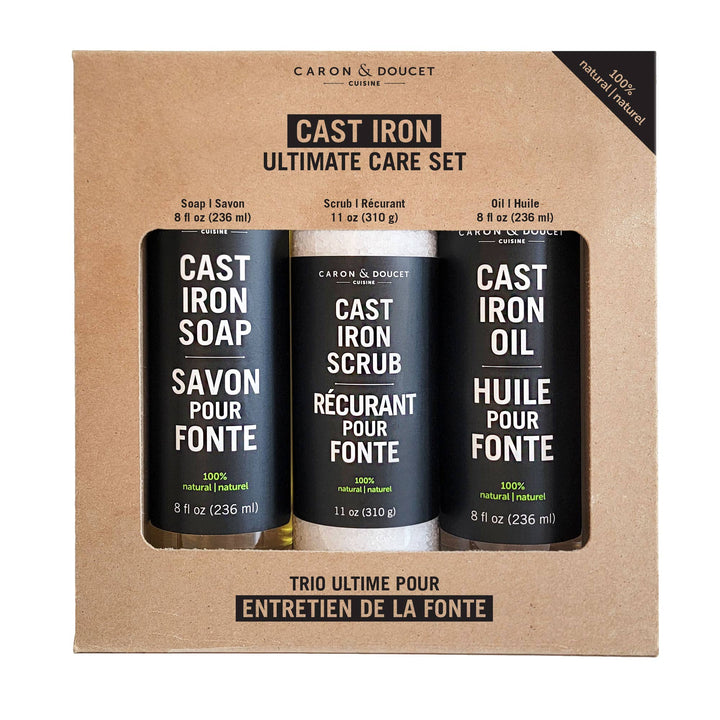 Caron & Doucet Cast Iron Ultimate Care Set packaging with three bottles on a cardboard background