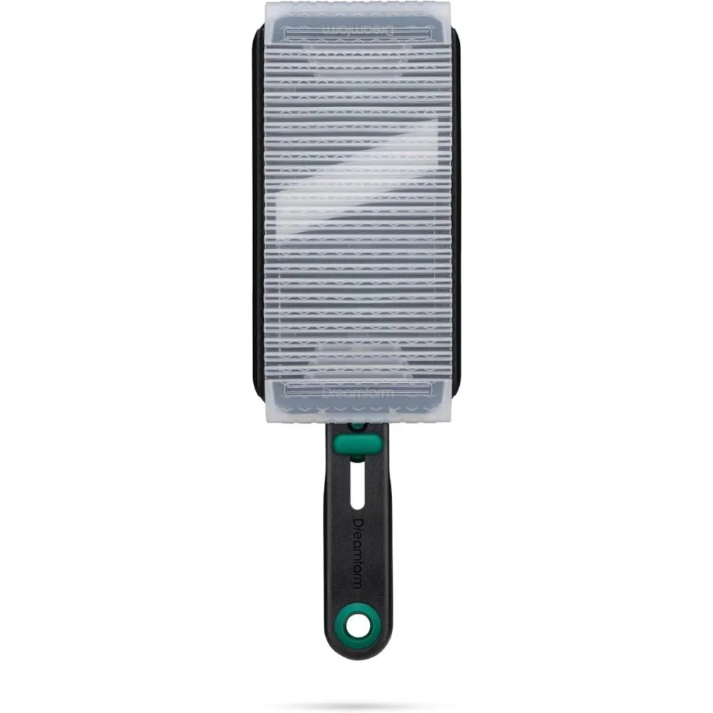 Mandoline with clear plastic cover and black handle on a white background