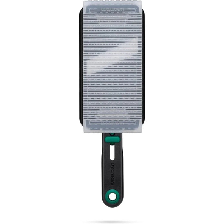 Mandoline with clear plastic cover and black handle on a white background