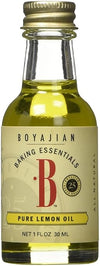 Small bottle of Boyajian Pure Lemon Oil on a white background