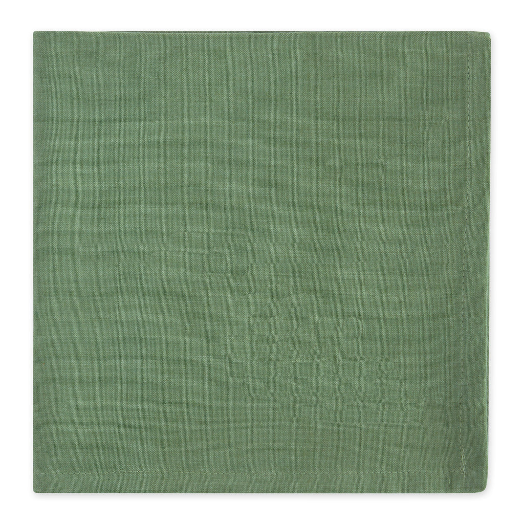 Green cloth napkin on a white background