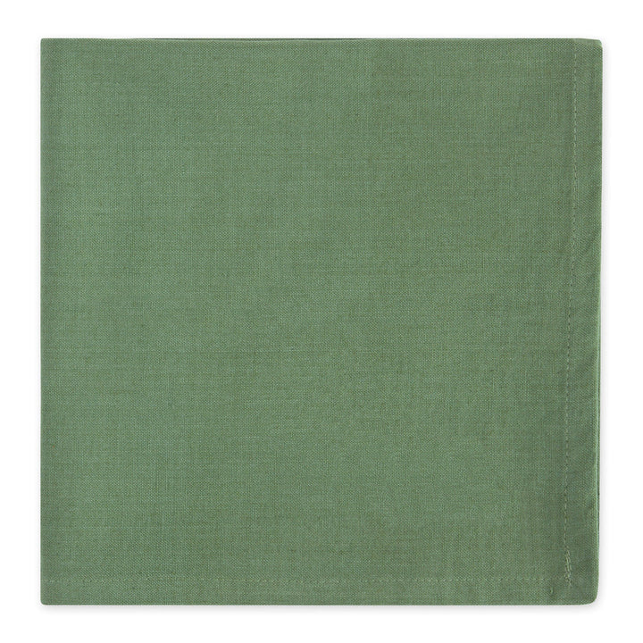 Green cloth napkin on a white background