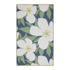 Floral patterned towel with white flowers and green leaves on a blue background