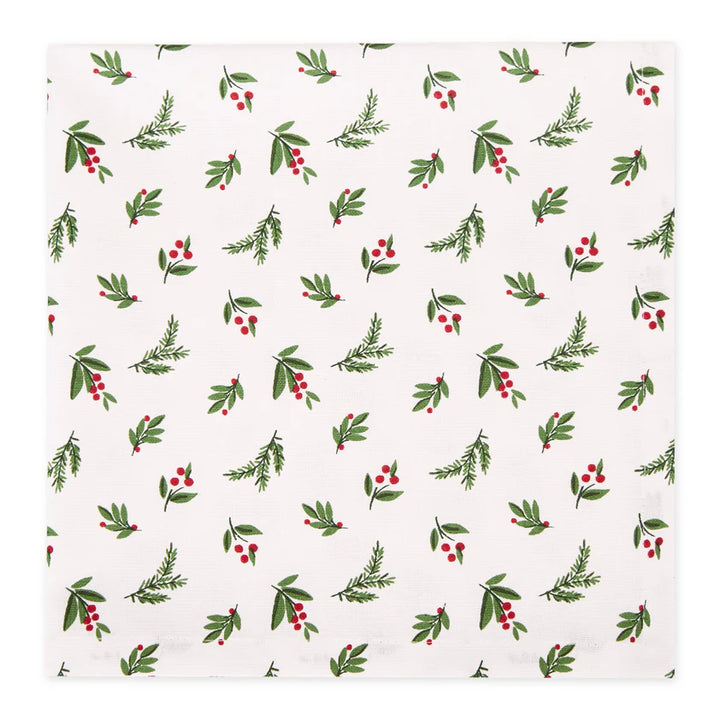 Christmas-themed patterned napkin with green leaves and red berries on a white background