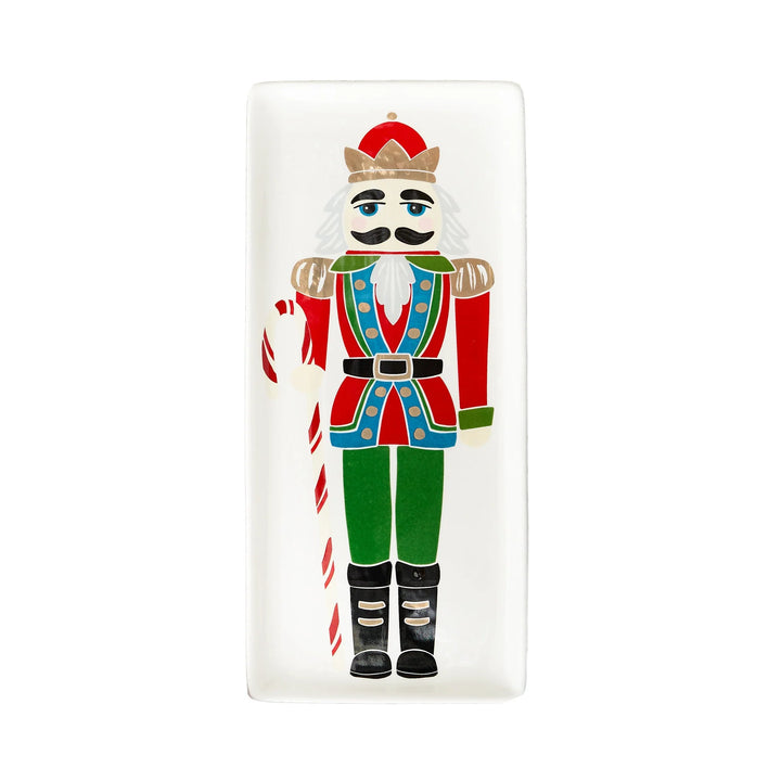 Decorative plate with a nutcracker design on a white background