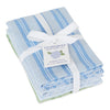 Set of three blue and white striped dishcloths with a white ribbon and tag on a white background
