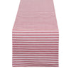 Red and white striped fabric table runner on a white background
