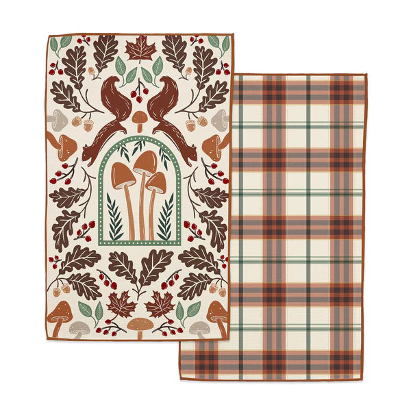 Reversible decorative towel with autumn-themed patterns on a white background