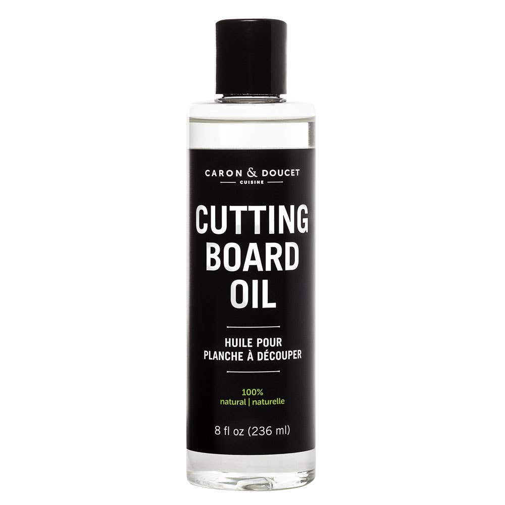 Bottle of Caron & Doucet cutting board oil on a white background