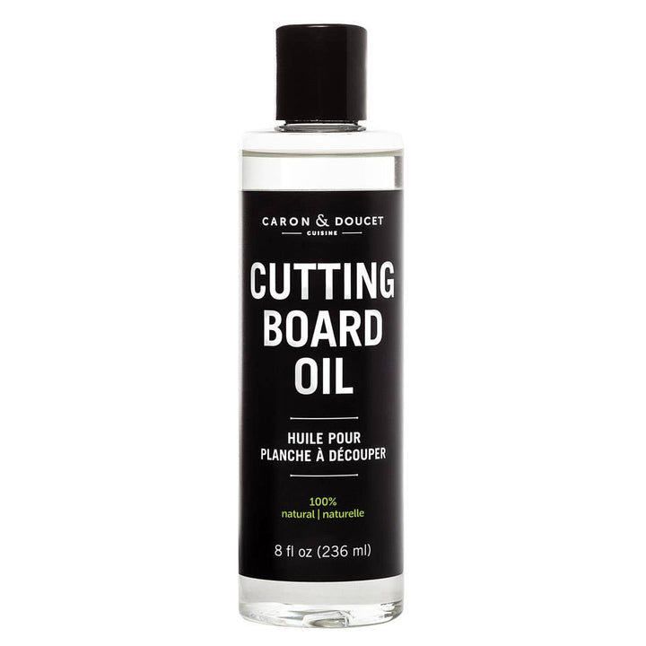 Bottle of Caron & Doucet cutting board oil on a white background
