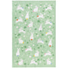 Dishcloth with white rabbit pattern on a green background
