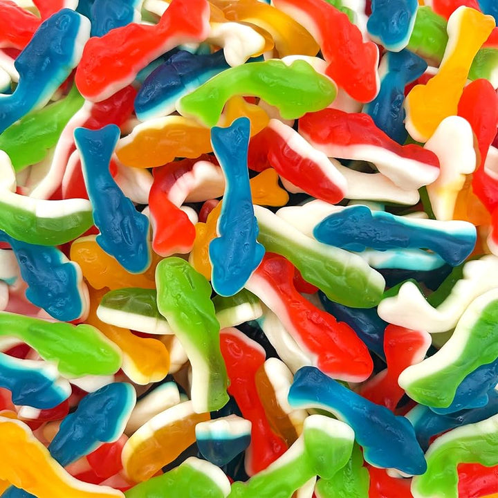 Colorful gummy fish candies in a pile