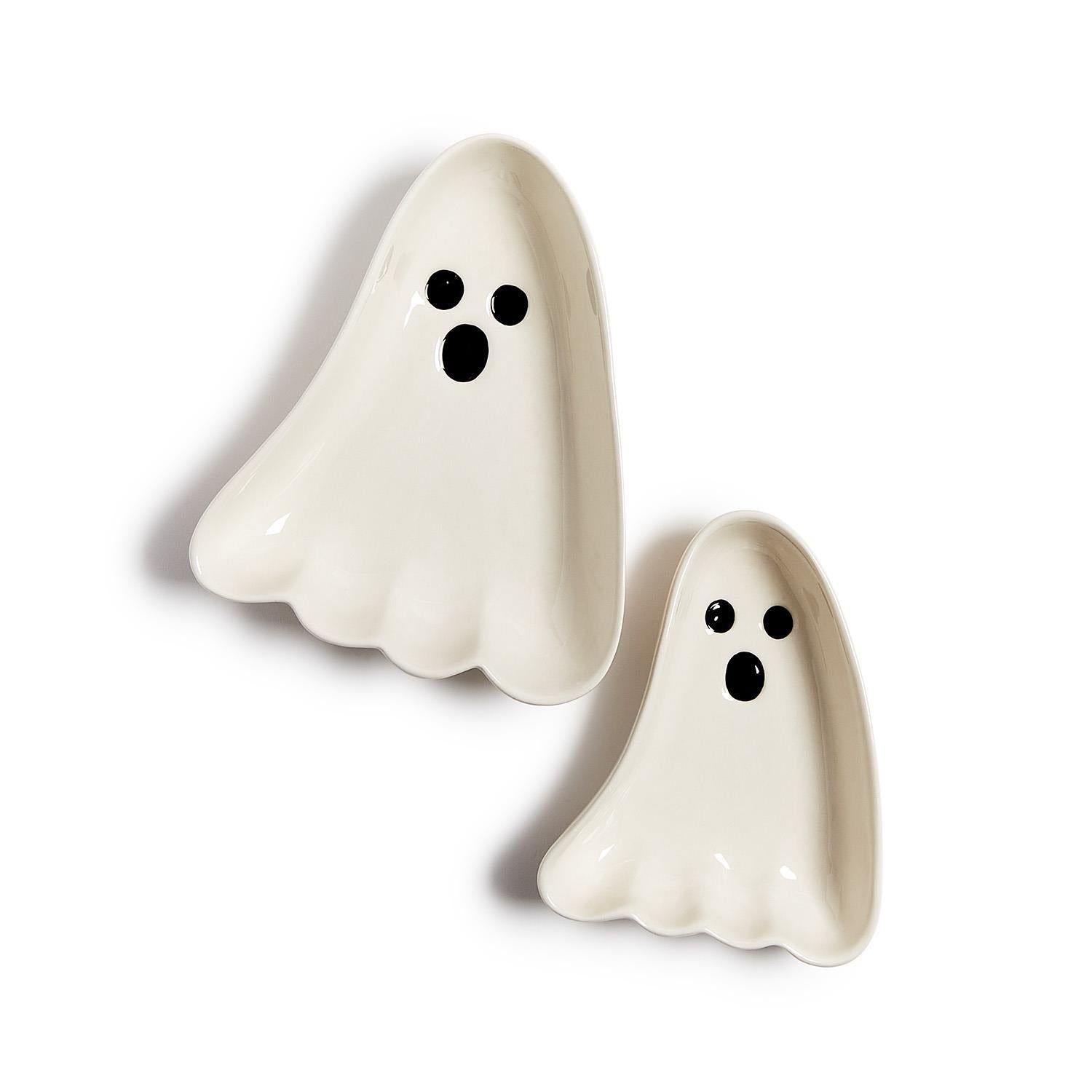 Two ghost-shaped bowls on a white background