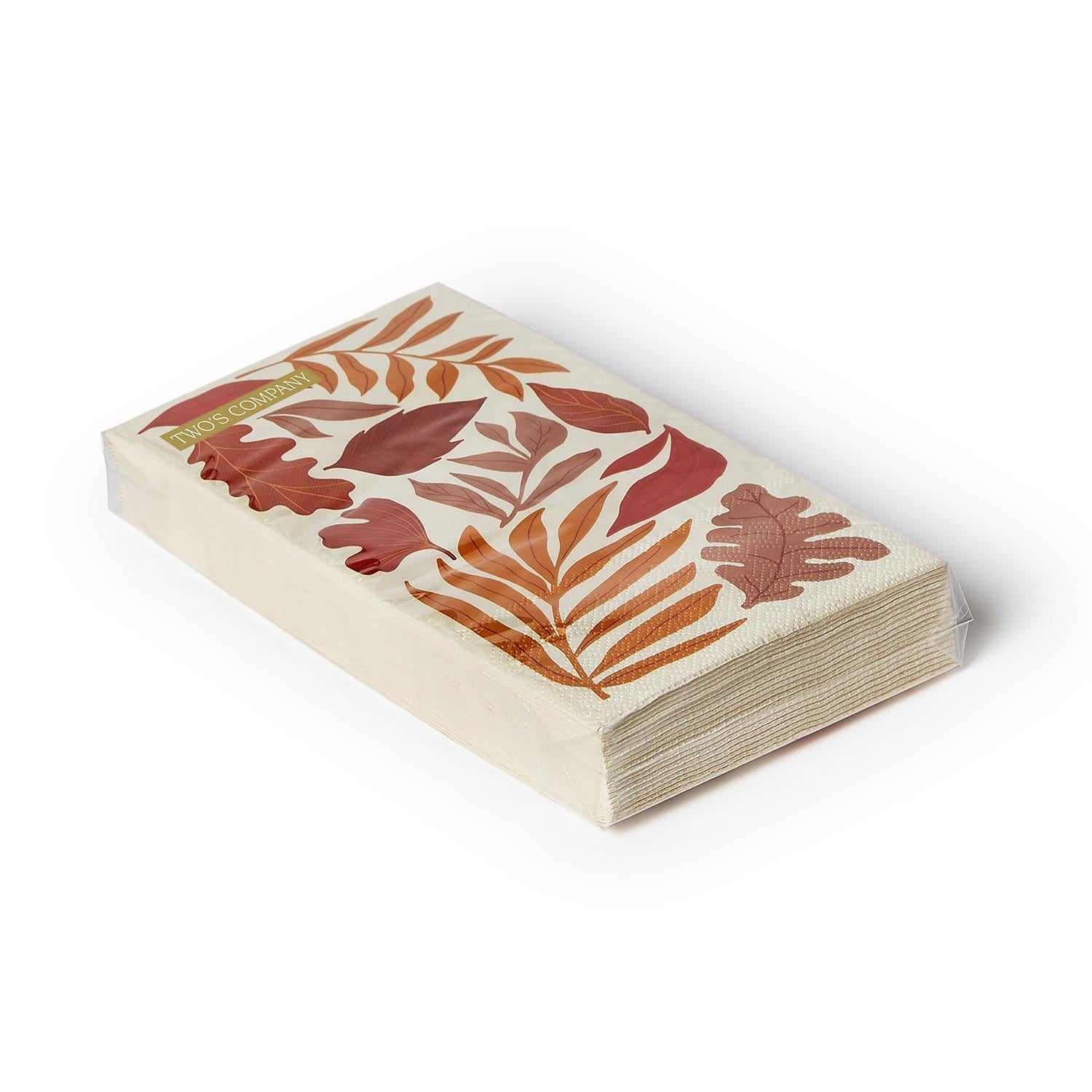 Stack of paper napkins with leaf pattern on a white background