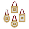 Set of gold picture frames with red ribbons and holly leave embellishments on a white background